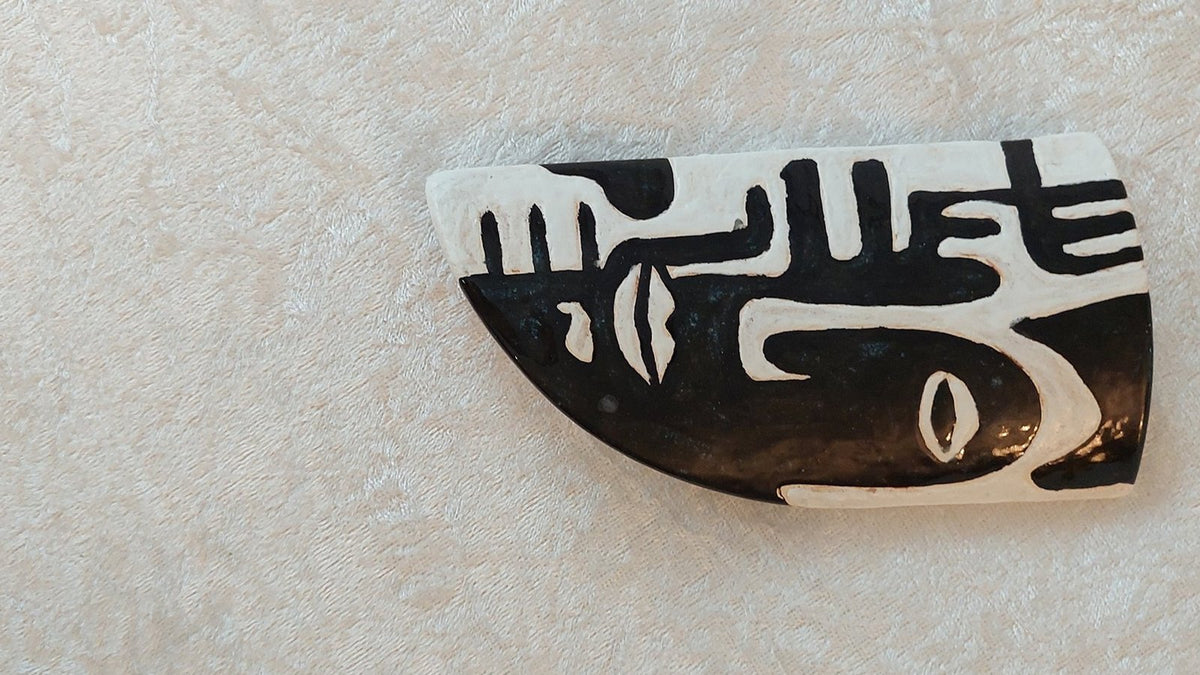 Ansigtsfragment I – keramikrelief